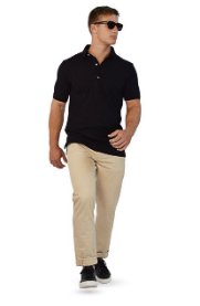 A person walking in a black shirtDescription automatically generated